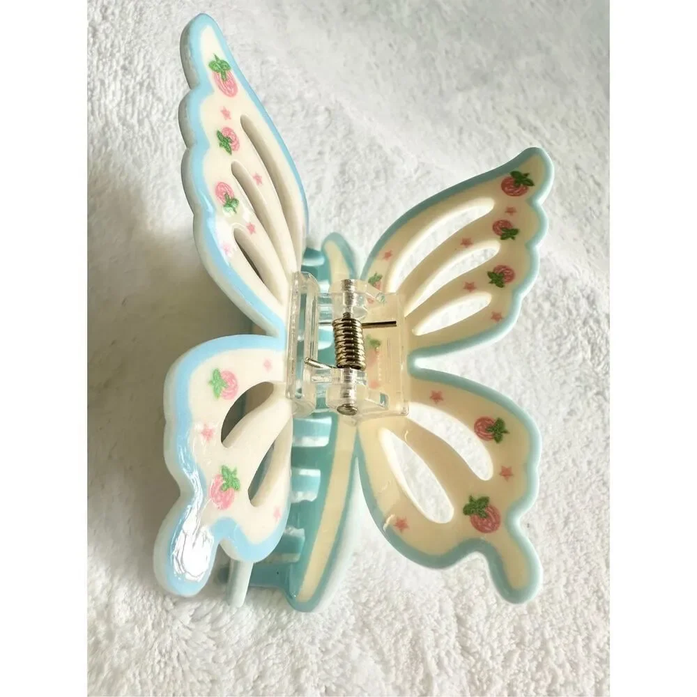 Adorable strawberry pink, blue, and cream - butterfly hair claw ￼